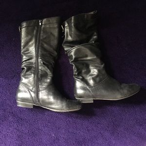 Black leather boots. Short