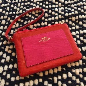 Red + pink Coach wristlet. Brand new!