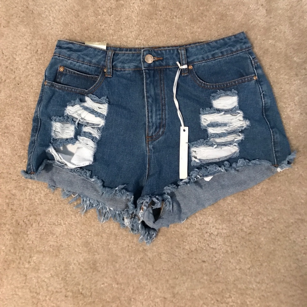 Blue jean shorts distressed