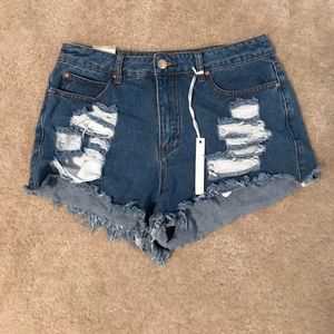 Blue jean shorts distressed