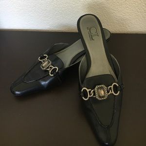 Black mules with gem ornament
