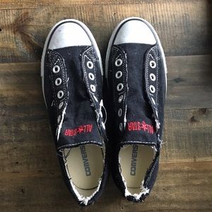 Converse: Chuck Taylor Slip On Black Sneakers