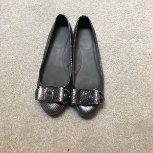 Size 9 Stuart Weitzman shiny silver flats