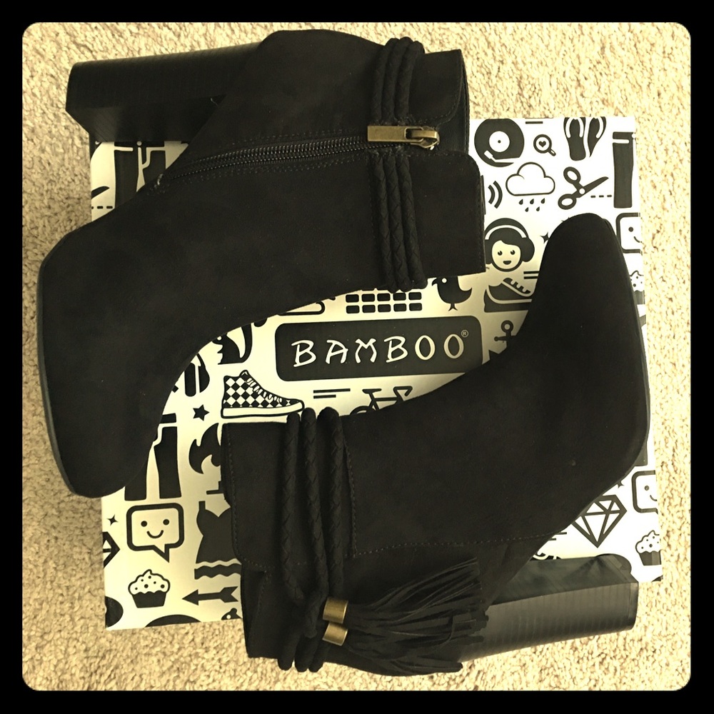 Faux suede ankle high boots.  Never worn!
