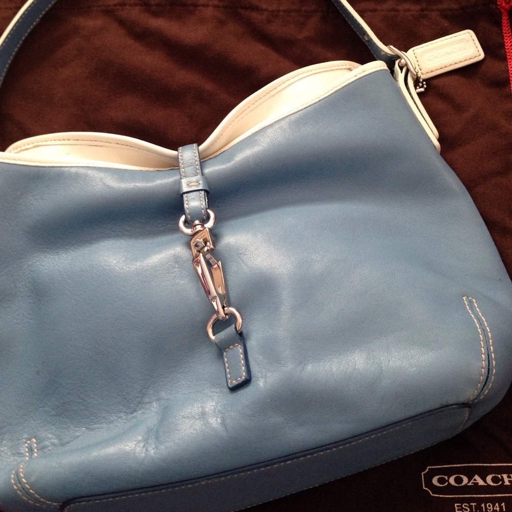 Buy this authentic coach and get free clothes!