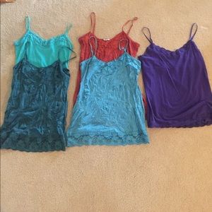 5 tanks of varying colors and sizes