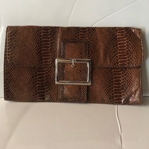 Faux animal skin brown clutch