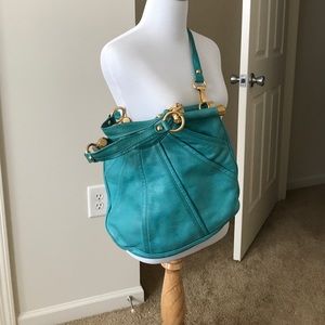 B. Makowsky turquoise leather handbag
