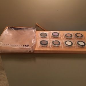 8 Urban Decay eye shadows with clear bag