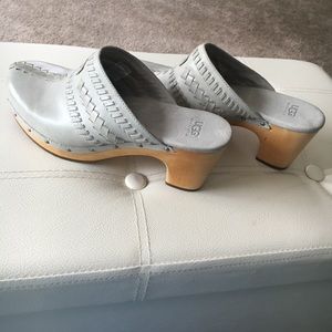 Grey Ugg clog with wooden heel.