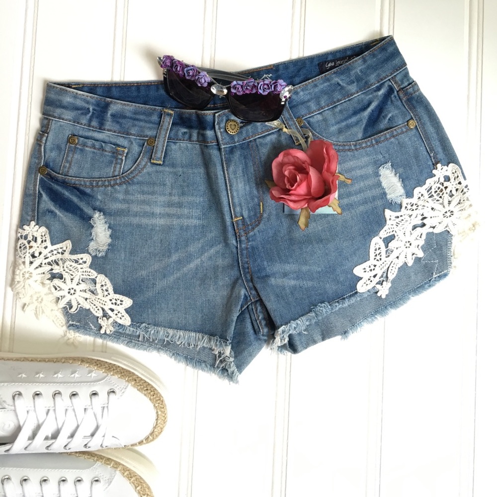 Denim booty shorts crochet ends