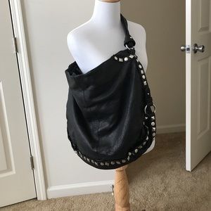 Sabina black leather and studs slouchy handbag