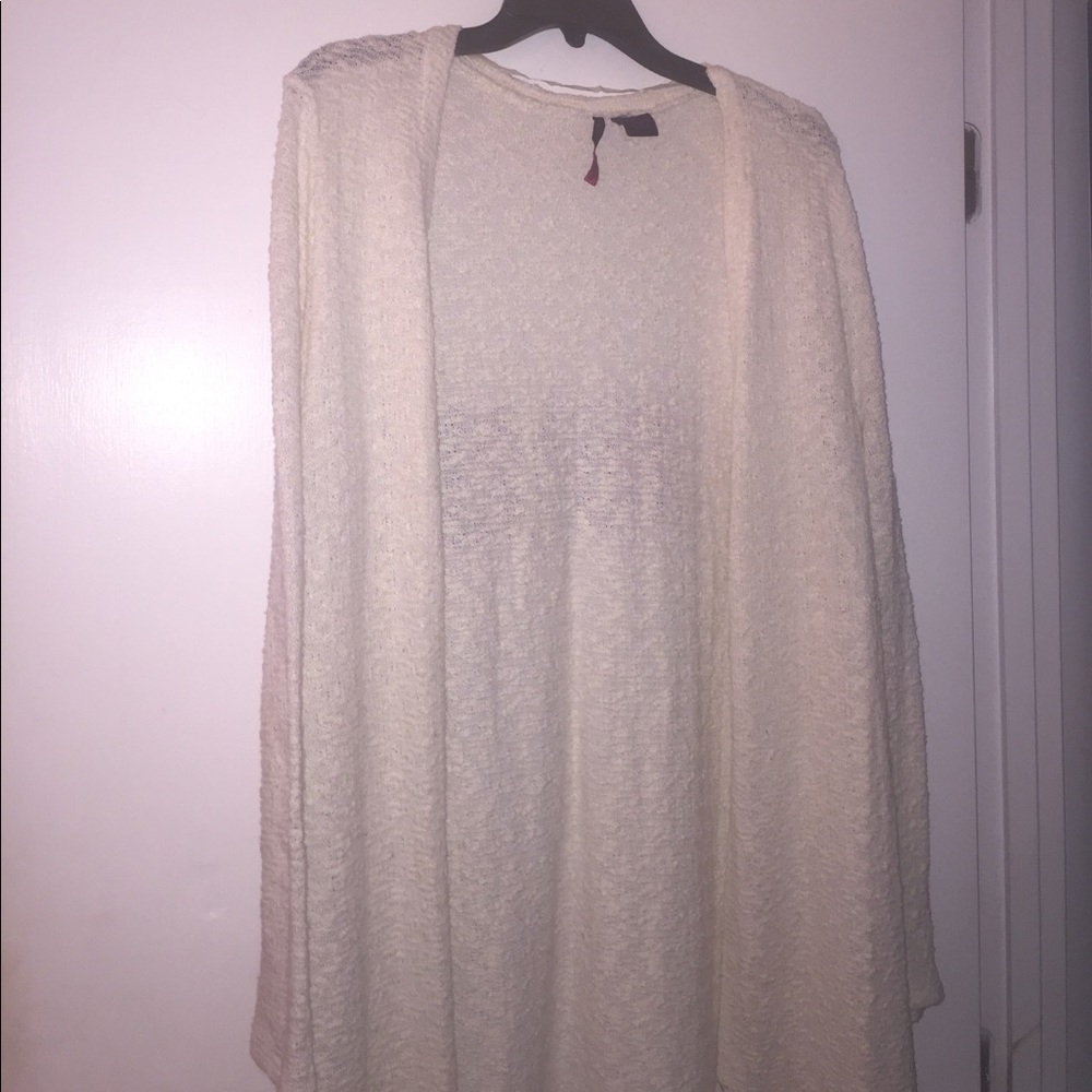 Long, cream duster