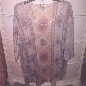 Sheer, tribal pattern top