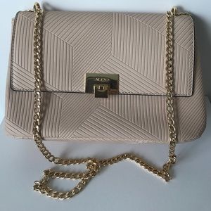 Beautiful Light Cream Aldo HandBag with Gold Chain