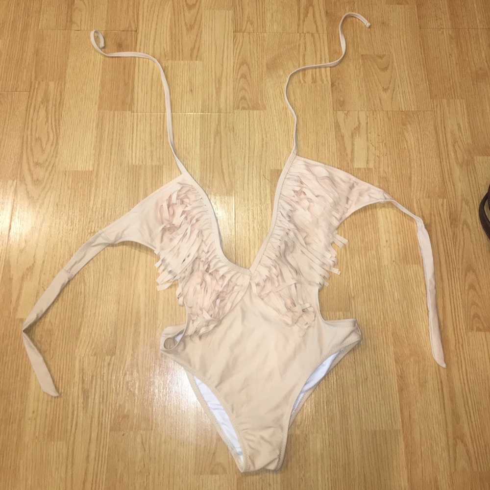 Plunging neck line nude fringe bathing suit