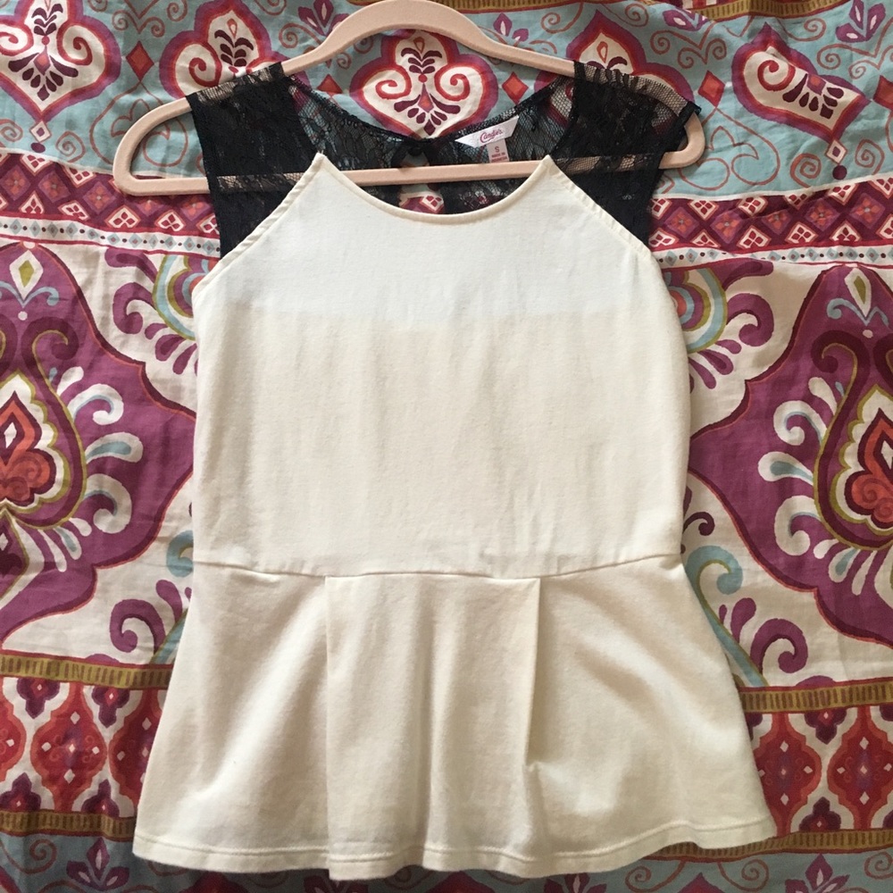 Cream colored blouse with black lace