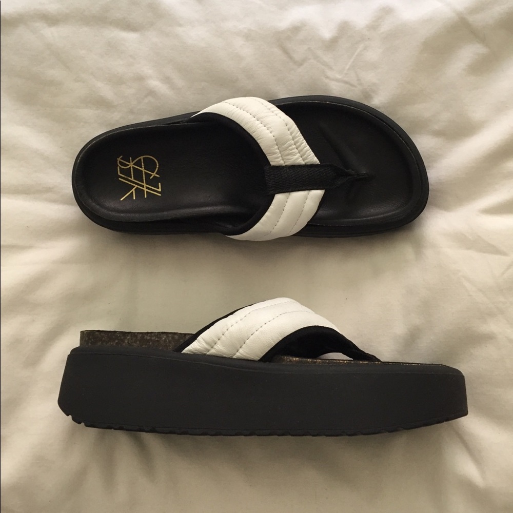 YES slip on leather platform sandal. Never worn.