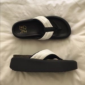 YES slip on leather platform sandal. Never worn.