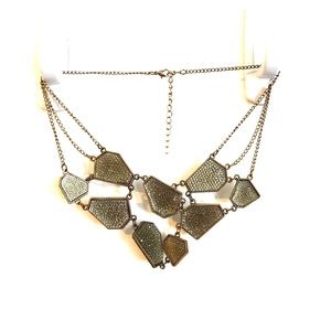 Maurice's statement necklace.