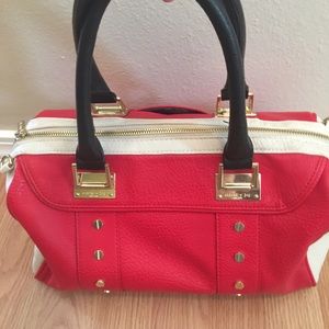 Red, cream and black purse by Olivia + Joy