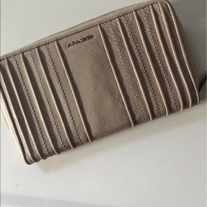 Coach taupe leather zip around large wallet