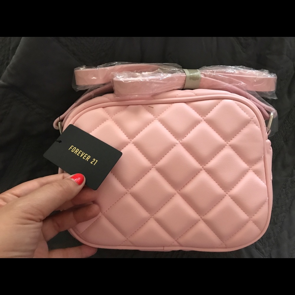 SOLD!!!!!!!!!!!!!!Very cute light pink cross body