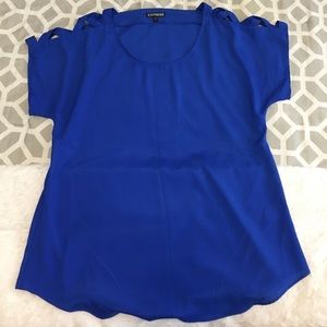 Blue express top with geometric cut-out sleeves