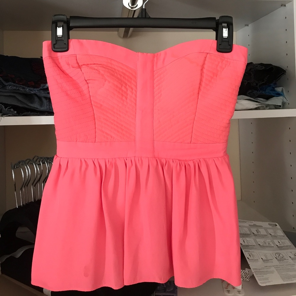 Peplum strapless coral top