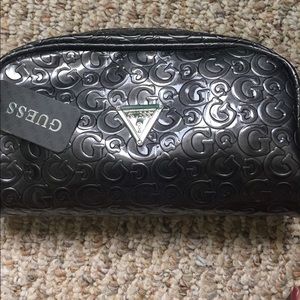 New guess with tags make up bag