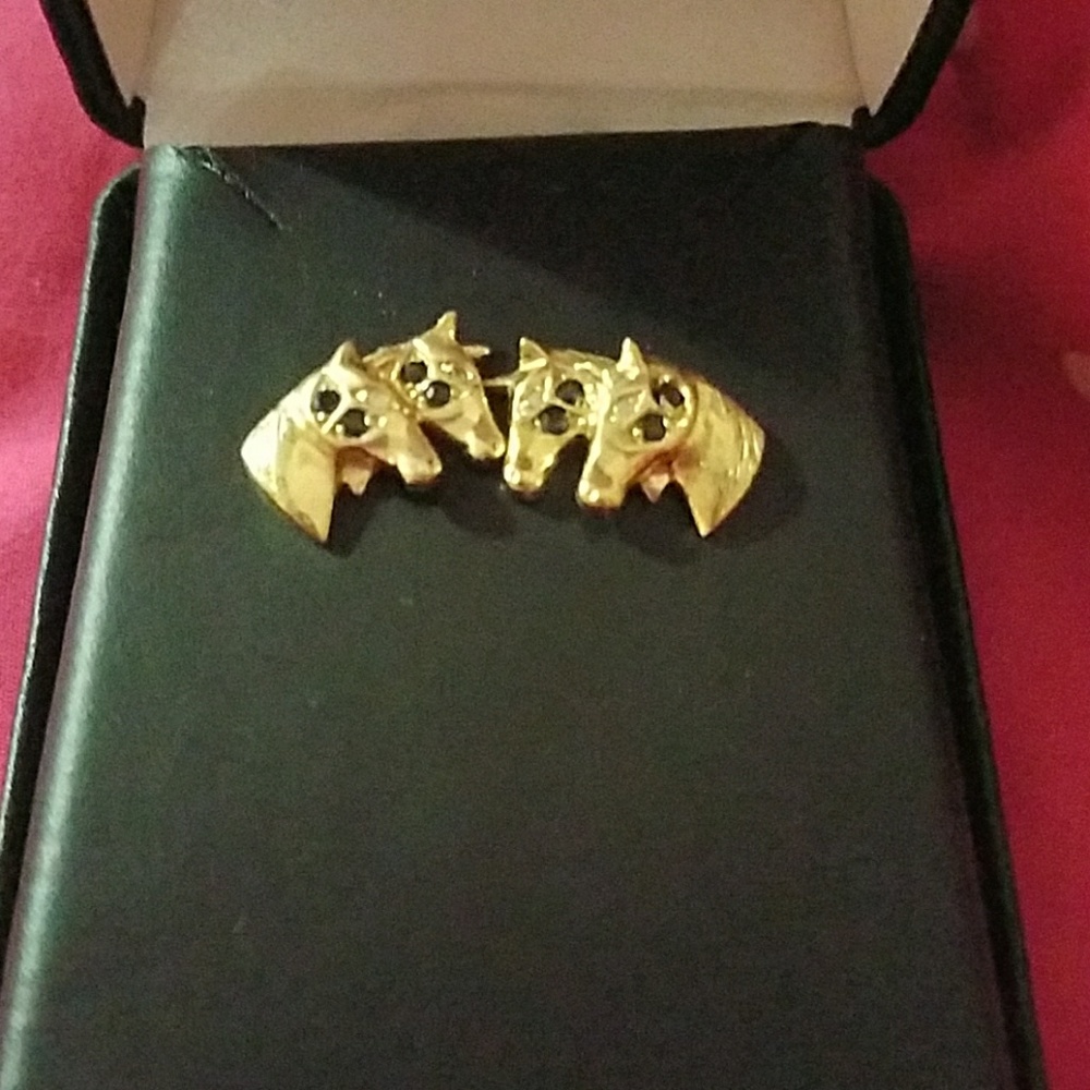 Beautiful gold horse earrings