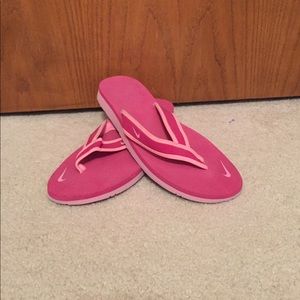 Pink NIKE flip flops