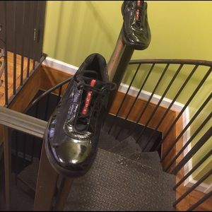 All black patient leather Prada shoes