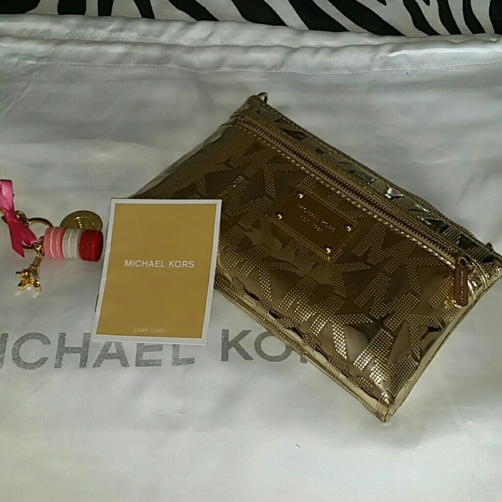 Authentic Pale Gold Mk Wristlet