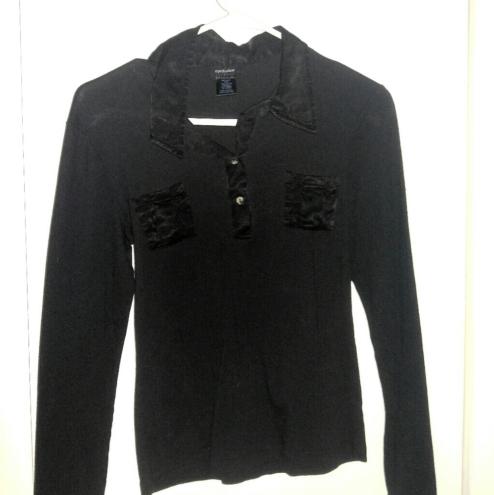 Black woman's dress shirt. Very soft material.