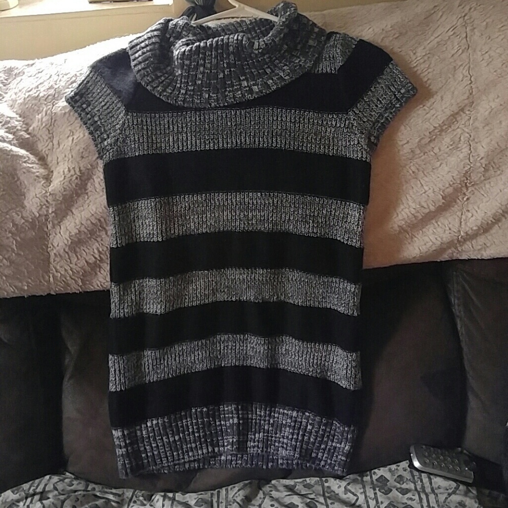Girls large 10-12 sweater with loose turtle neck.