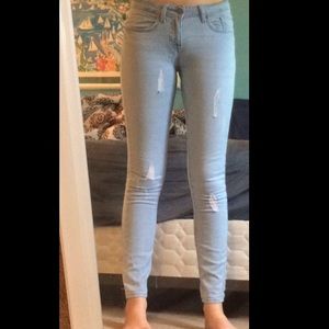 Forever 21 light wash distressed skinny jeans