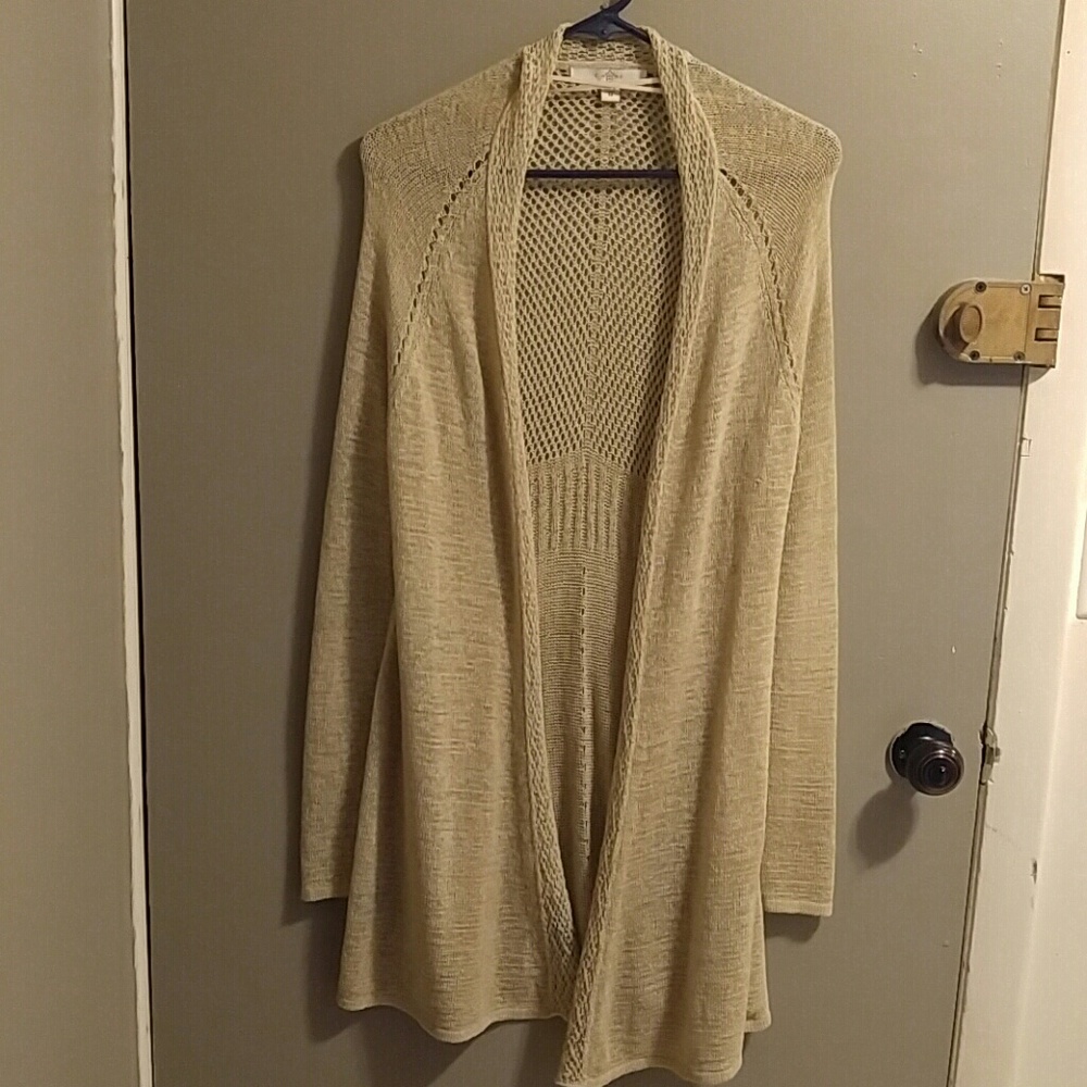 Woman's knitted long sleeve sweater
