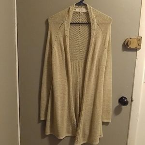 Woman's knitted long sleeve sweater