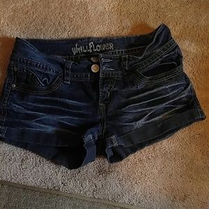 Woman's distressed short shorts.