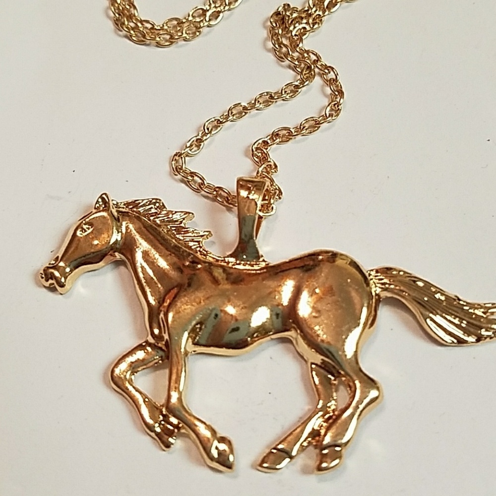 Beautiful stainless steel gold tone horse