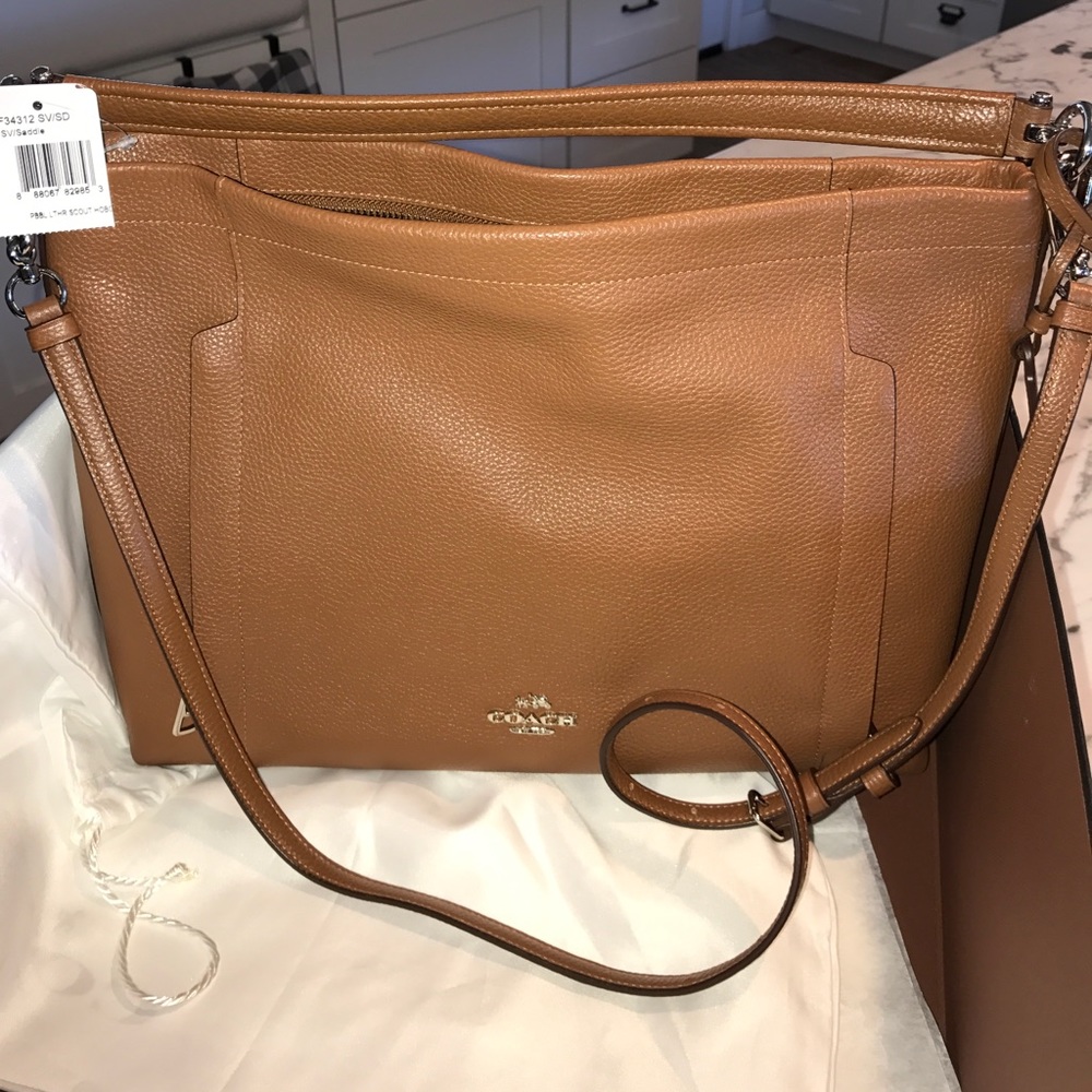 Brand new Scout Hobo Coach purse in Pebble