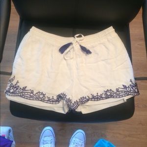 White and navy flowy shorts