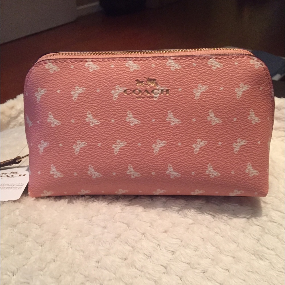 Coach butterfly blush chalk makeup bag.