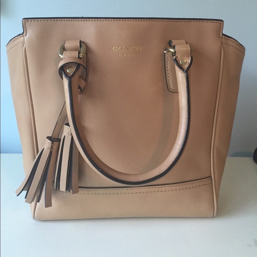 Coach handbag with tassel