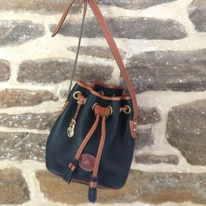 Dooney & Bourke vintage draw string bag with brass