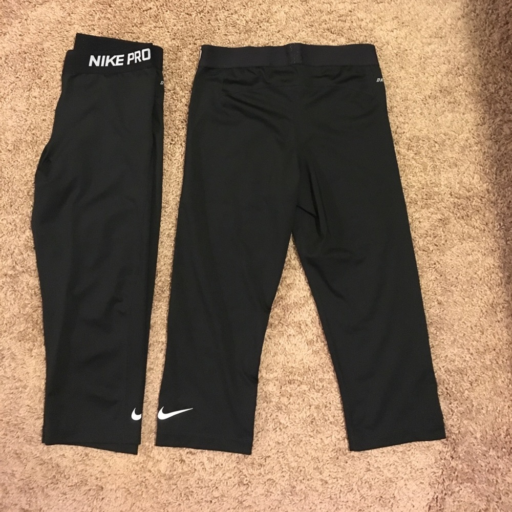 Two pairs of Nike Pro Dri-Fit leggings