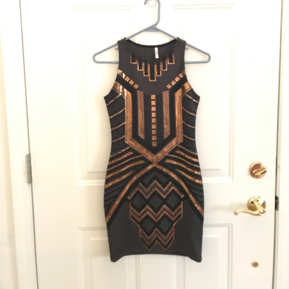 Tight women's black and gold mini dress!