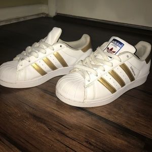 Adidas white and gold superstar
