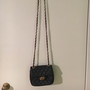 Small black quilted purse